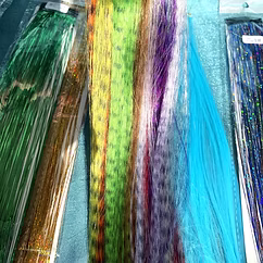 Loose fairy hair tinsel strand samples in a rainbow of colors